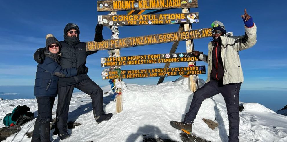 Climbers approaching Kibo Peak via Marangu Route on 6-day Kilimanjaro adventure