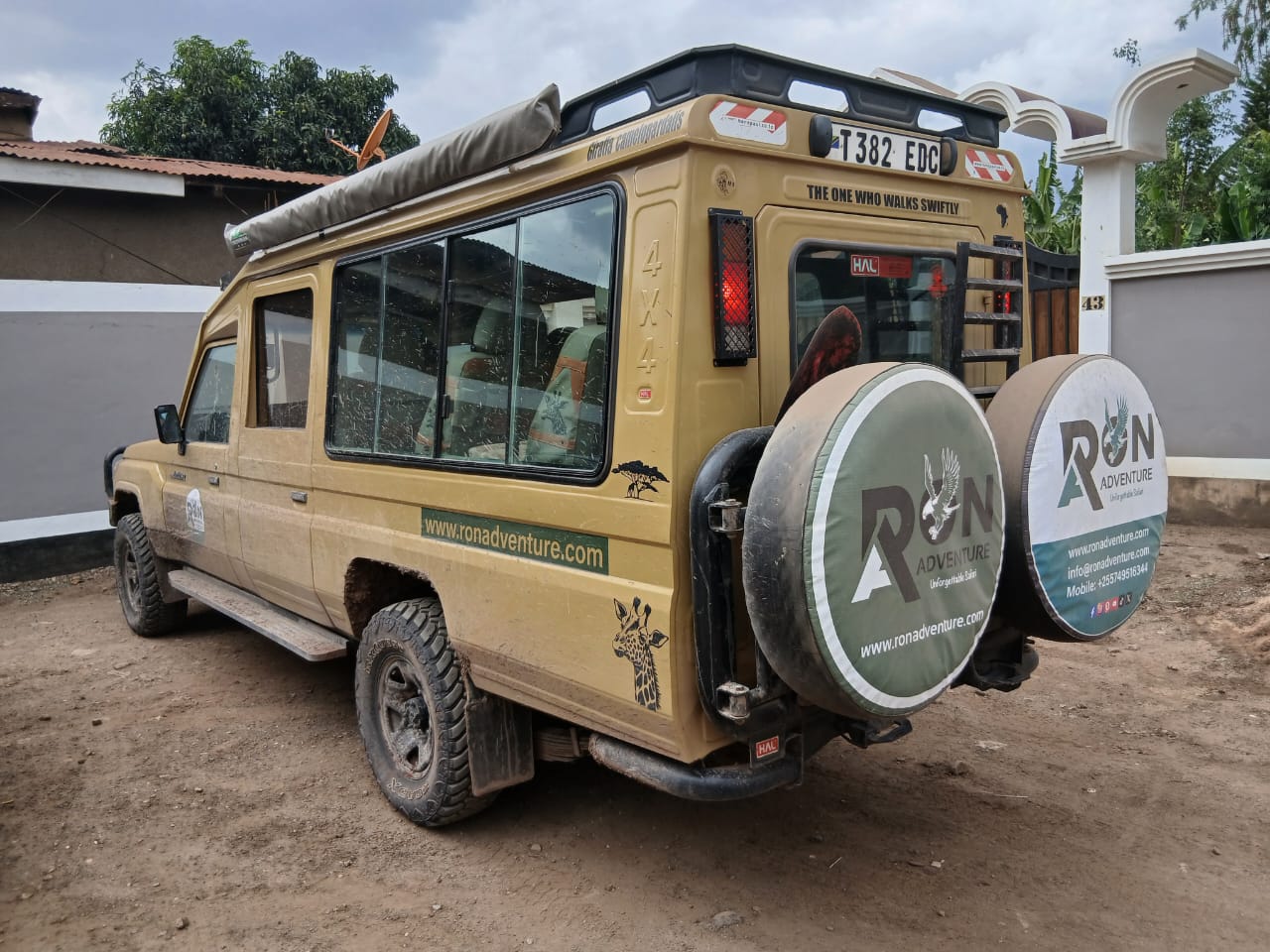 Safari vehicle game drive in Serengeti during peak wildlife season Tanzania