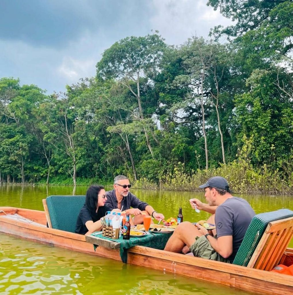 Visitors enjoying a boat tour on Lake Duluti during a 3-day Arusha cultural tour