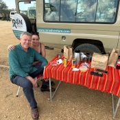 Tanzania Bucket List 2027 with elephants, Mount Kilimanjaro and safari vehicle